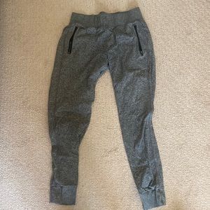 Dark grey Zella joggers with zip pockets. Size M